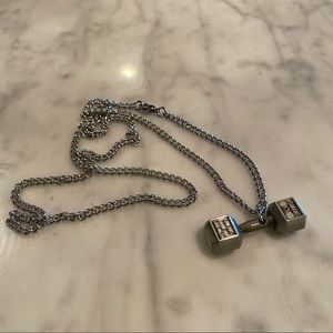 “Shields of Strength” dumbbell necklace